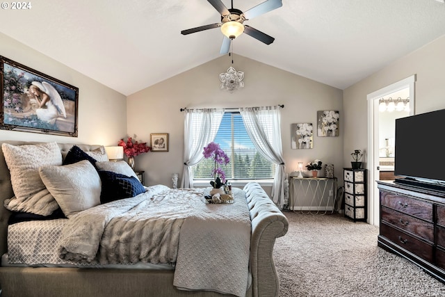 bedroom with ensuite bath, carpet floors, lofted ceiling, and ceiling fan