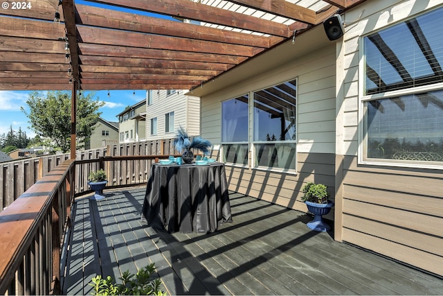 wooden deck featuring a pergola