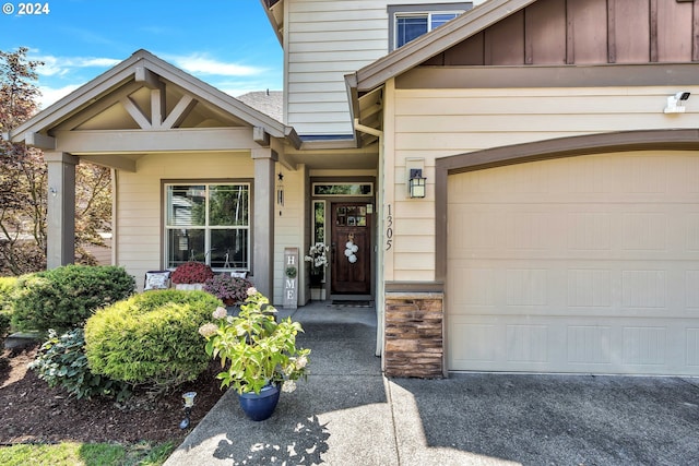 property entrance with a garage