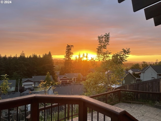 view of balcony at dusk