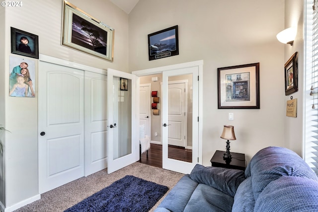 carpeted living room with french doors