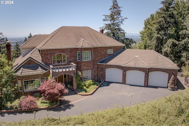 view of front of property with a garage