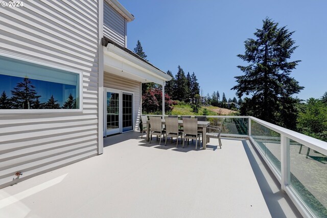 view of patio / terrace with a balcony