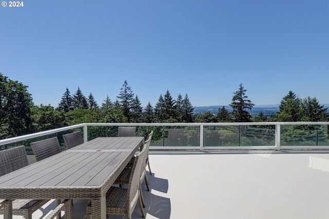 view of patio featuring a balcony