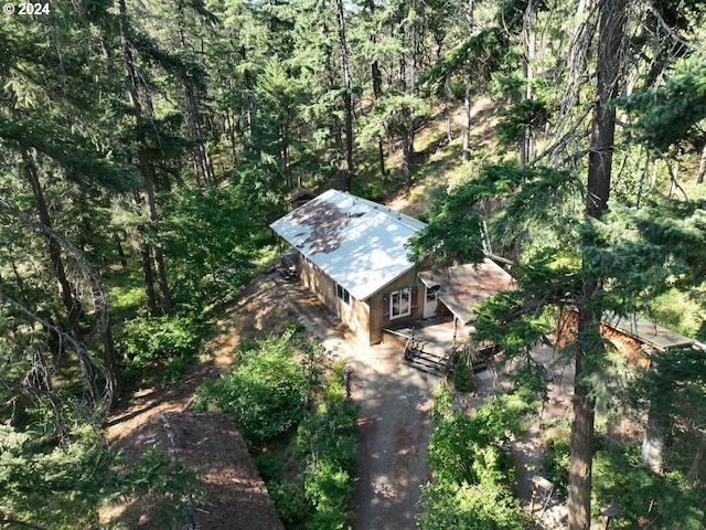 bird's eye view featuring a forest view