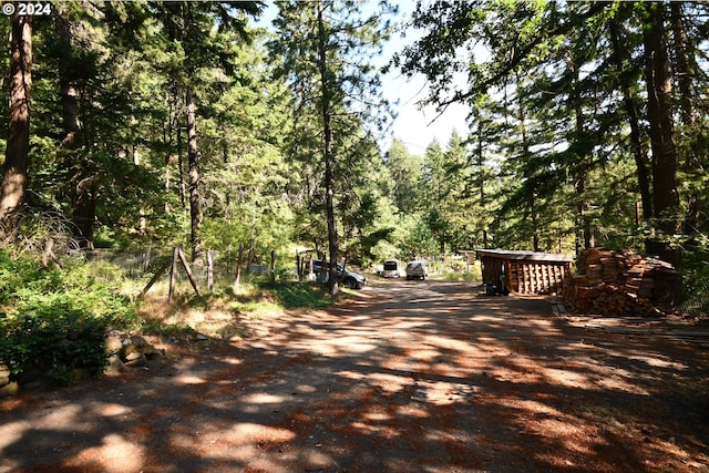 view of road featuring a view of trees