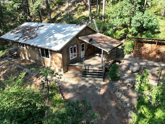 view of front of property with a deck and metal roof