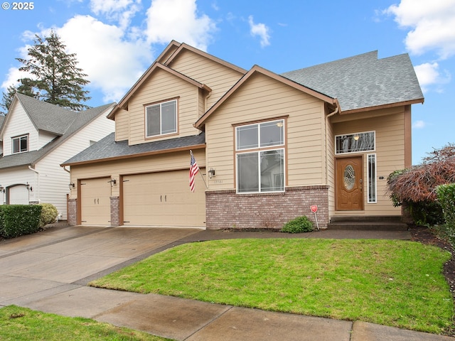 view of front of house with a garage and a front lawn