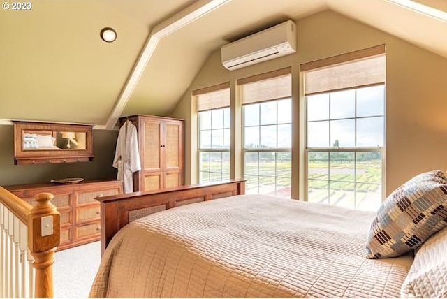 bedroom with an AC wall unit, light carpet, and vaulted ceiling