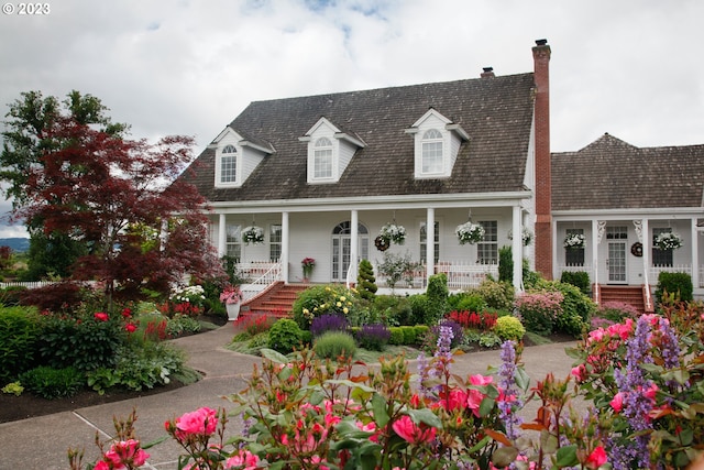 cape cod house with covered porch