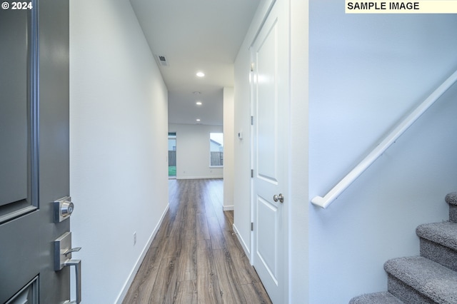 corridor featuring hardwood / wood-style flooring