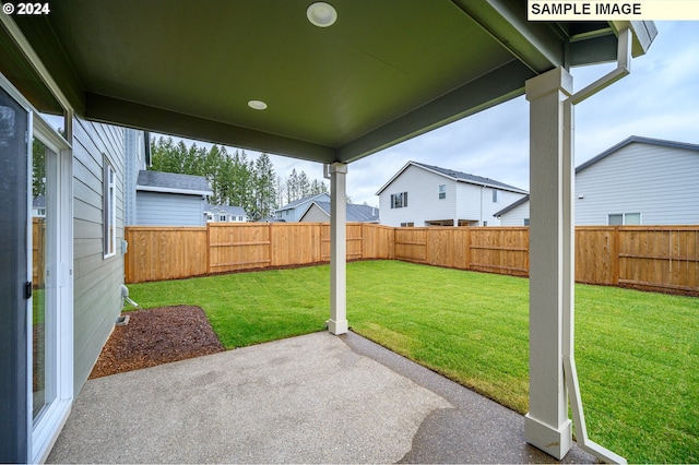 view of yard with a patio area