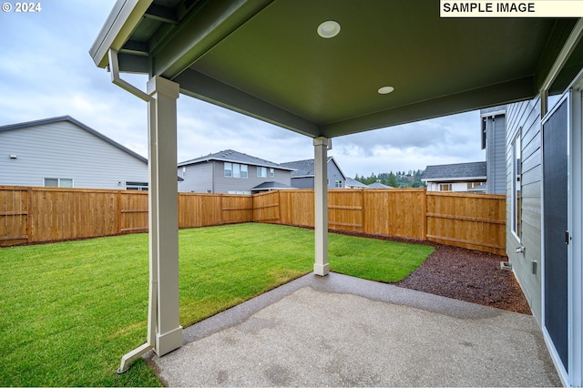 view of yard with a patio area