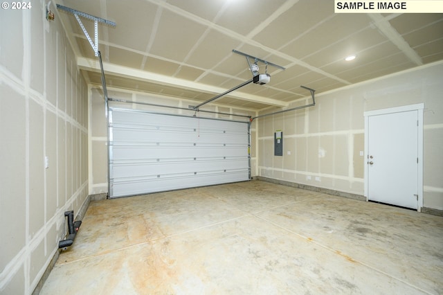 garage featuring electric panel and a garage door opener