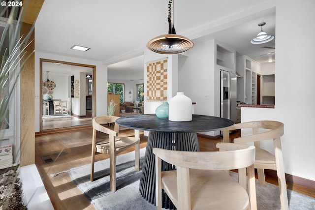 dining room featuring dark wood-type flooring