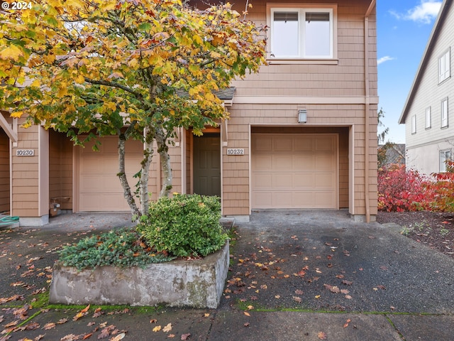 view of front of property with a garage