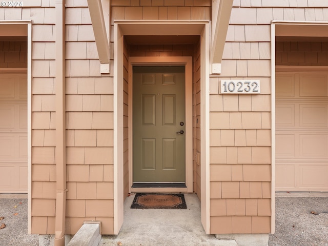 property entrance featuring a garage