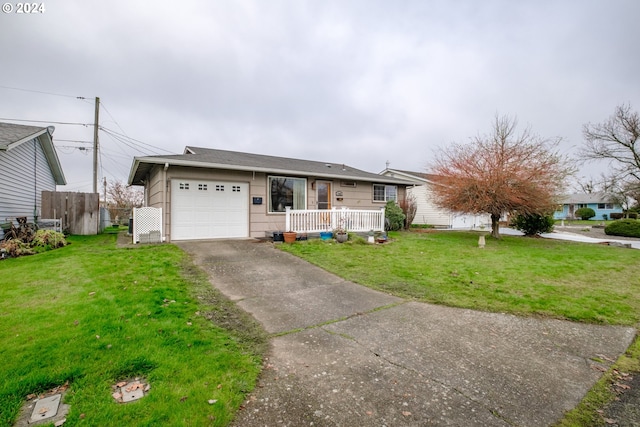 ranch-style house with a front lawn, a porch, and a garage