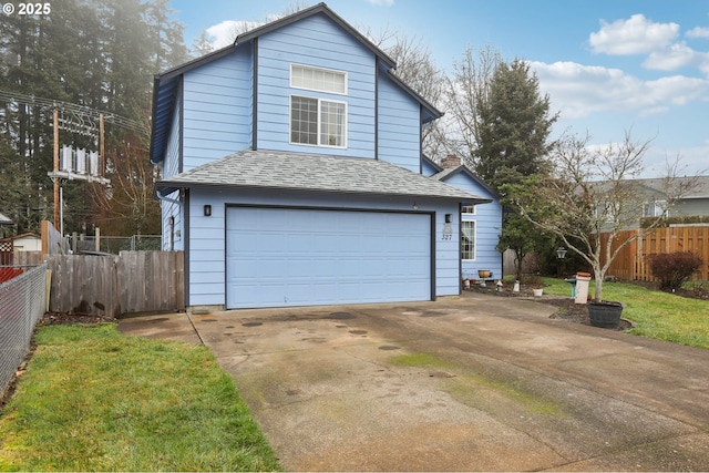 front of property featuring a garage and a front yard