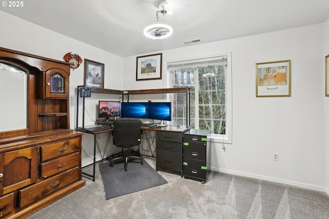 office area with light colored carpet