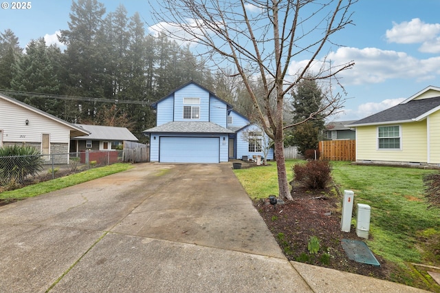 view of front of house with a front yard and a garage