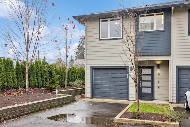 view of front of property with a garage