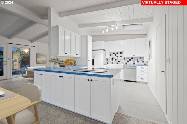 kitchen with white refrigerator with ice dispenser, dishwasher, a peninsula, black electric cooktop, and white cabinets
