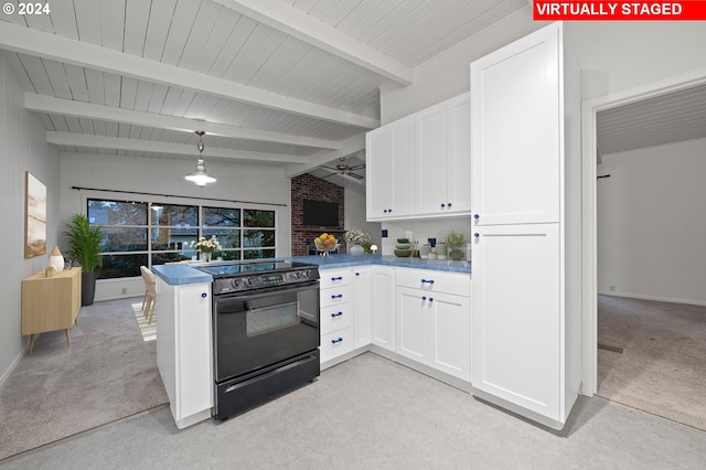 kitchen with a peninsula, black range with electric stovetop, ceiling fan, white cabinetry, and vaulted ceiling with beams