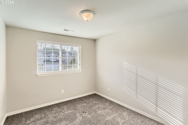 empty room with carpet floors