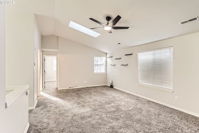 empty room with carpet flooring, ceiling fan, and lofted ceiling