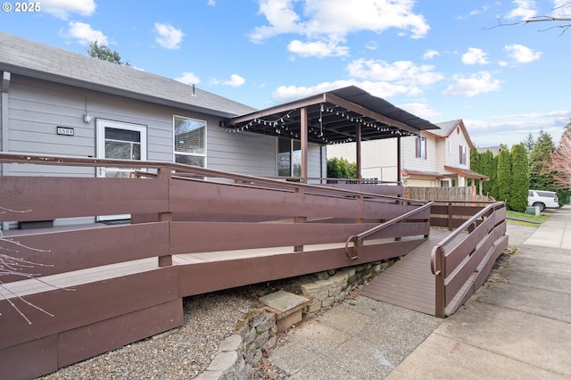 exterior space featuring a shingled roof