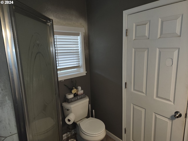 bathroom featuring toilet