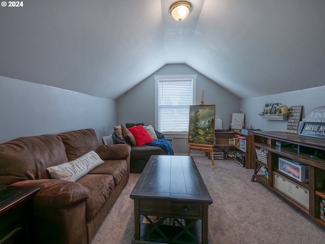 living room with carpet and lofted ceiling