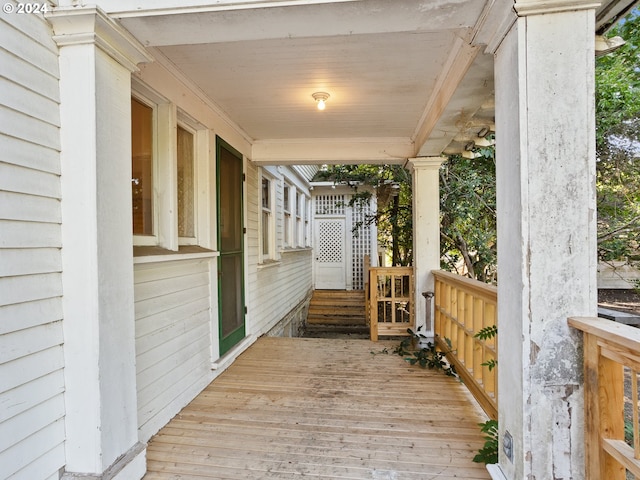 wooden deck featuring covered porch