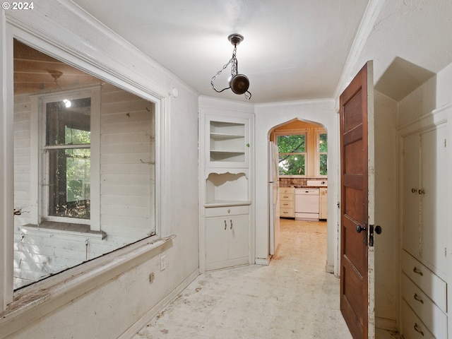 corridor featuring ornamental molding