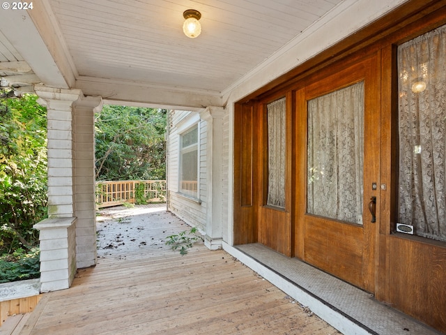 entrance to property with covered porch