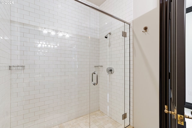 bathroom featuring walk in shower