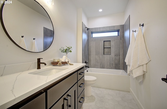 bathroom featuring toilet, shower / bathtub combination, tile patterned flooring, and vanity