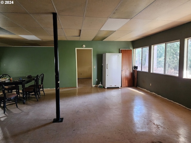 interior space featuring a paneled ceiling