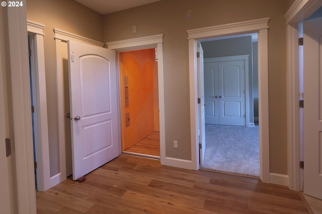 hallway featuring light hardwood / wood-style floors