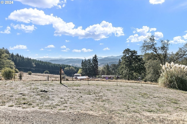 view of mountain feature featuring a rural view