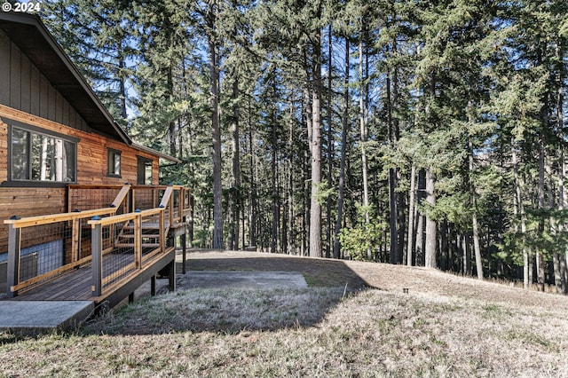 view of yard featuring a wooden deck