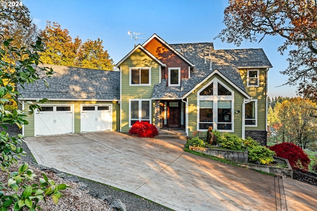 craftsman inspired home with a garage