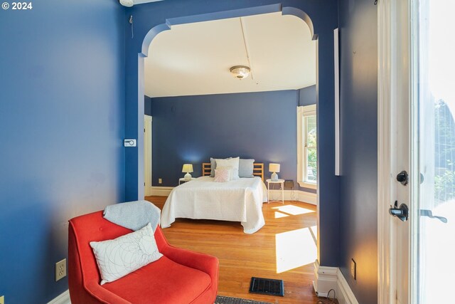 bedroom featuring wood-type flooring