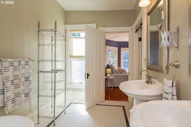 bathroom with tile patterned flooring