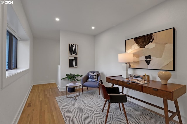 home office with light wood-type flooring