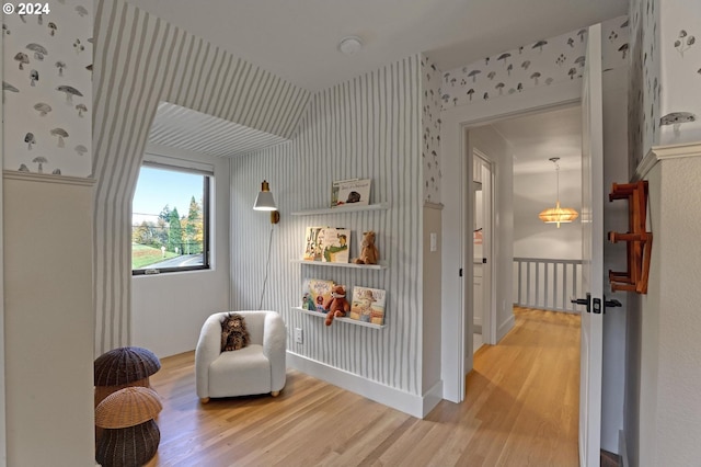 sitting room featuring hardwood / wood-style flooring