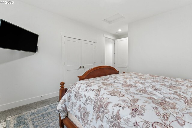 carpeted bedroom with a closet