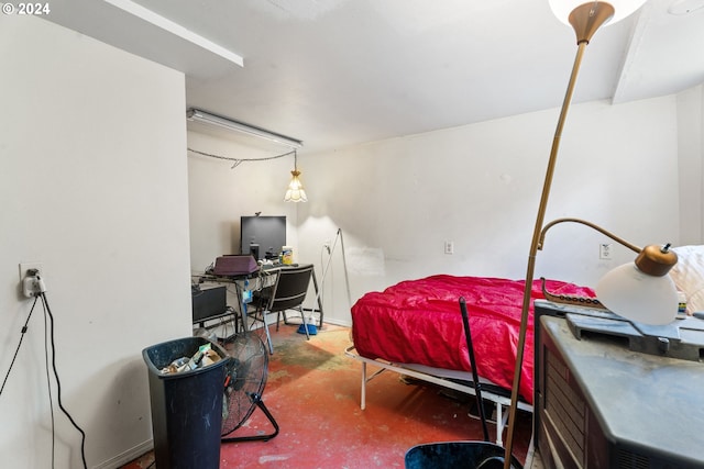 bedroom with concrete flooring