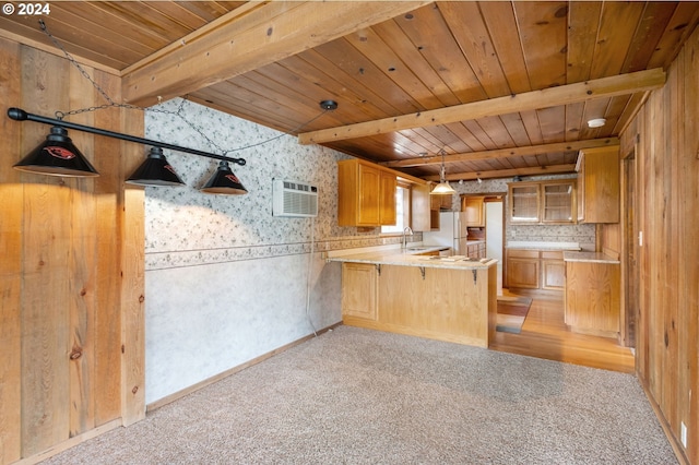 kitchen with wood ceiling, beamed ceiling, light carpet, and kitchen peninsula